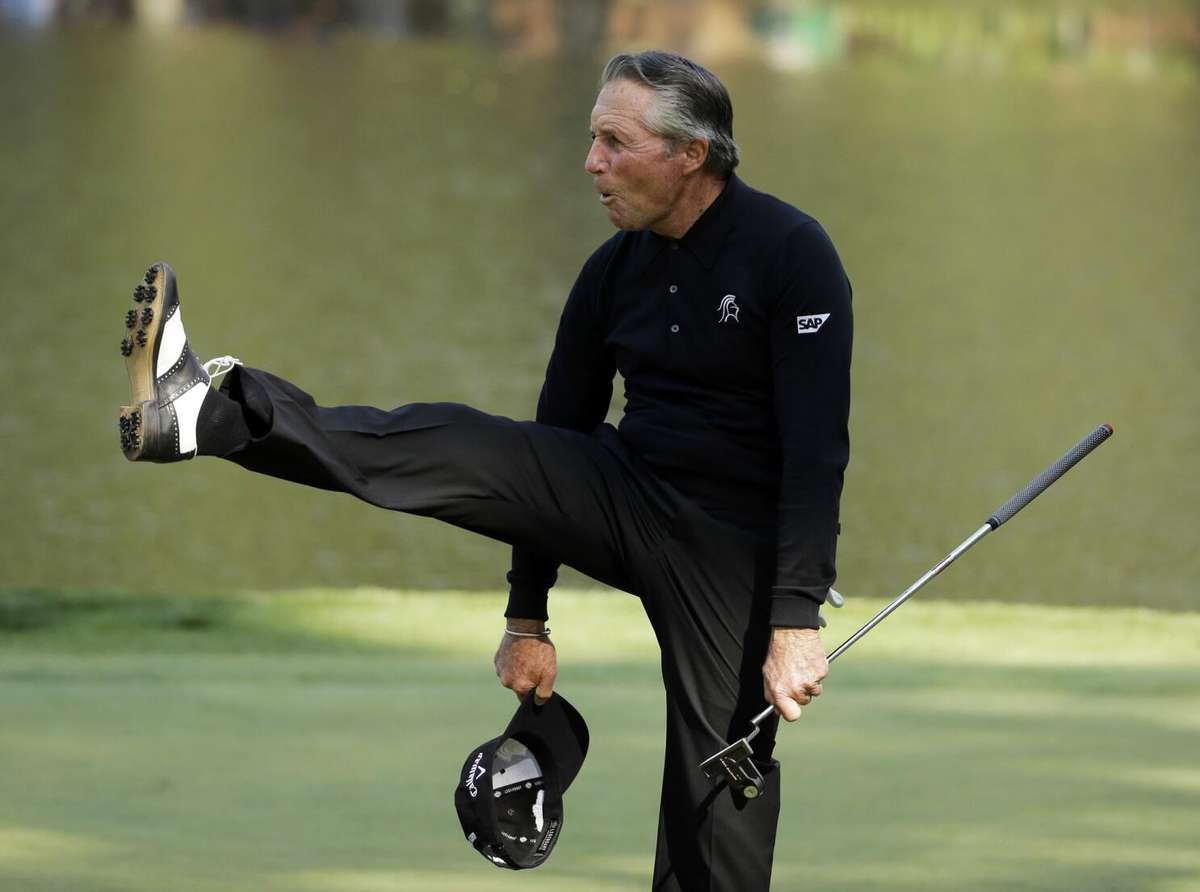 Gary Player performing a fitness routine on the practice green to stay tournament-ready
