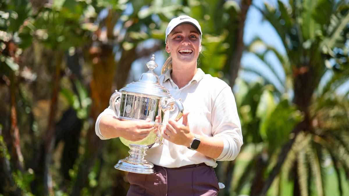 Close-up of the U.S. Women’s Open trophy on a pedestal at the clubhouse